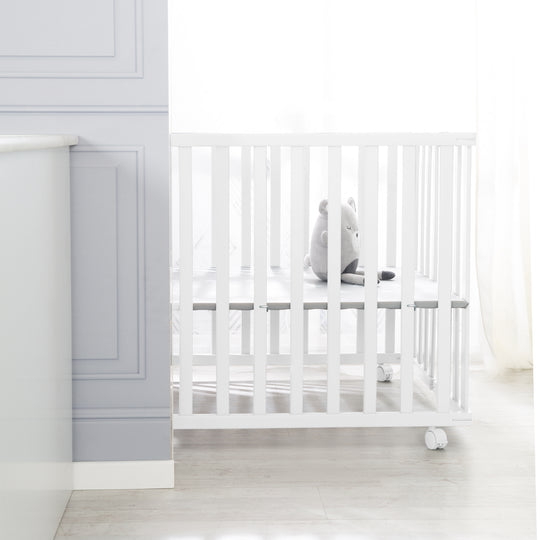 Corralito plegable 75x100 blanco + Almohadilla Little Stars - Ajustable en altura - Incluye ruedas