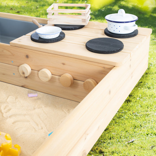 Bac à sable en bois - Design avec route, plaque de cuisson et bac de jeu - Naturel / Noir