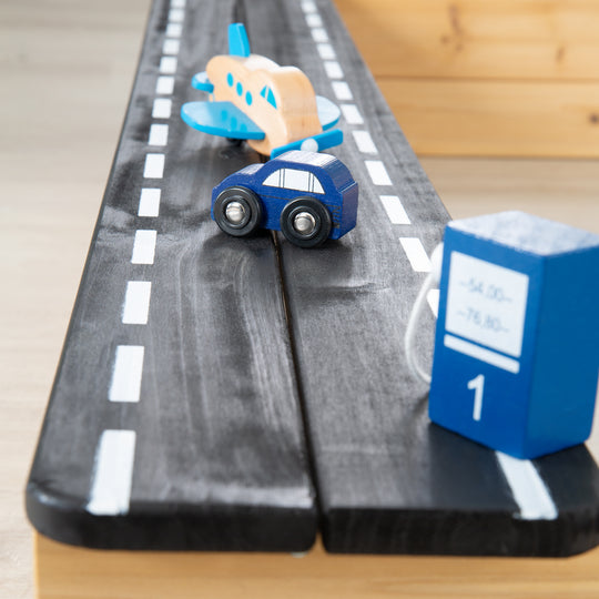 Bac à sable en bois - Design avec route, plaque de cuisson et bac de jeu - Naturel / Noir