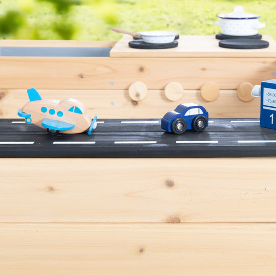 Bac à sable en bois - Design avec route, plaque de cuisson et bac de jeu - Naturel / Noir