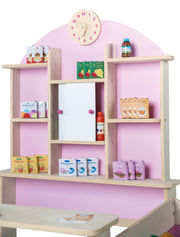 Shop in natural wood, including side counter, clock, back wall in pink & white sliding doors
