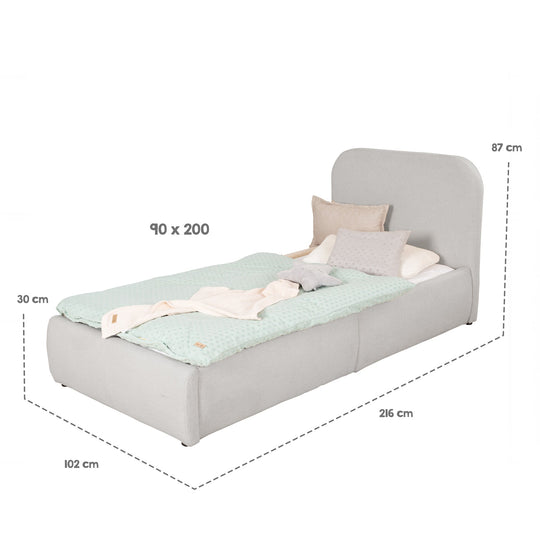 Maßgrafik des hellgrauen Kinderbetts: Liegefläche 90×200 cm, Gesamtmaße 216×102×87 cm, Bettkasten 30 cm.