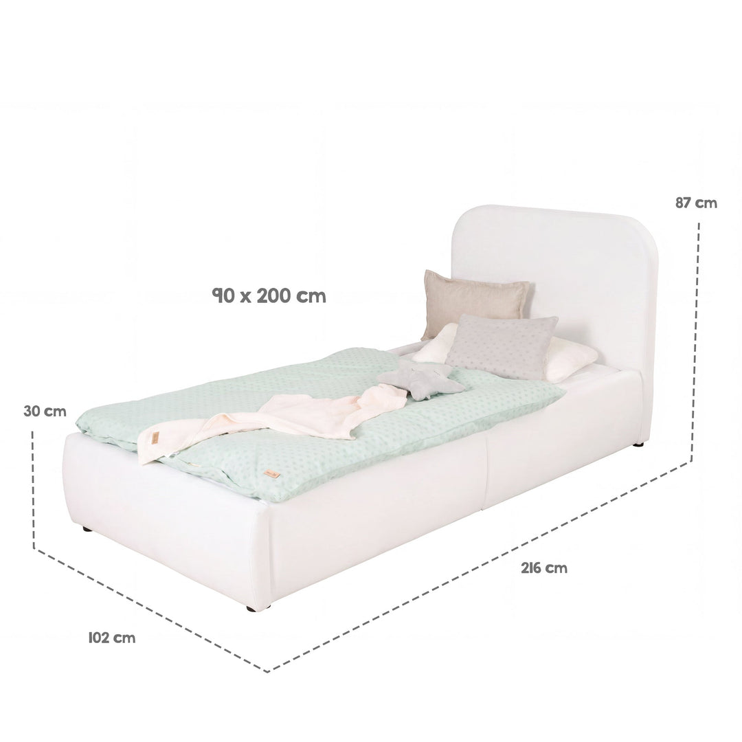 Schéma des dimensions du lit enfant blanc : surface de couchage 90×200 cm, dimensions totales 216×102×87 cm, coffre 30 cm.