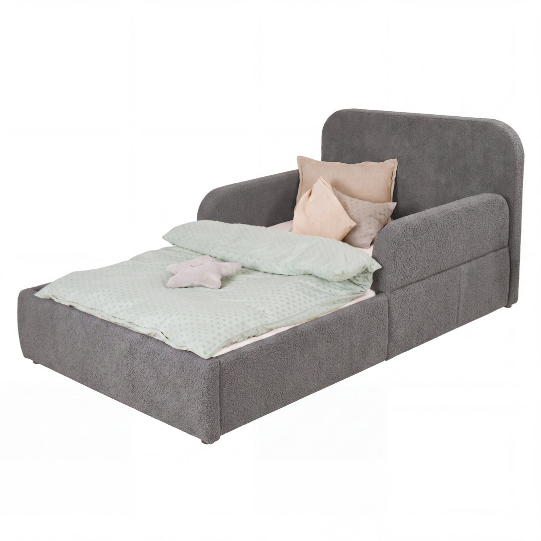 Lit gris en bouclé avec linge de lit menthe, détouré sur fond blanc.
