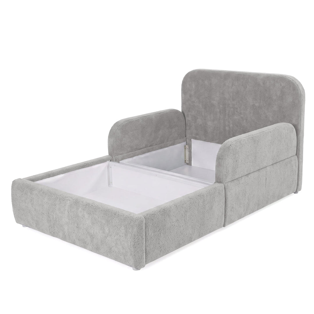Lit enfant roba Little Dream gris clair avec coffre ouvert et espace de rangement sous la surface de couchage. Partiellement générée par IA.