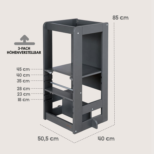 Gráfico de dimensiones de la torre de aprendizaje 'Step & Play' en Antracita: altura 85 cm, anchura 50,5 cm, profundidad 40 cm, superficie de apoyo regulable en 3 alturas con los niveles 18/23/28/35/40/45 cm.