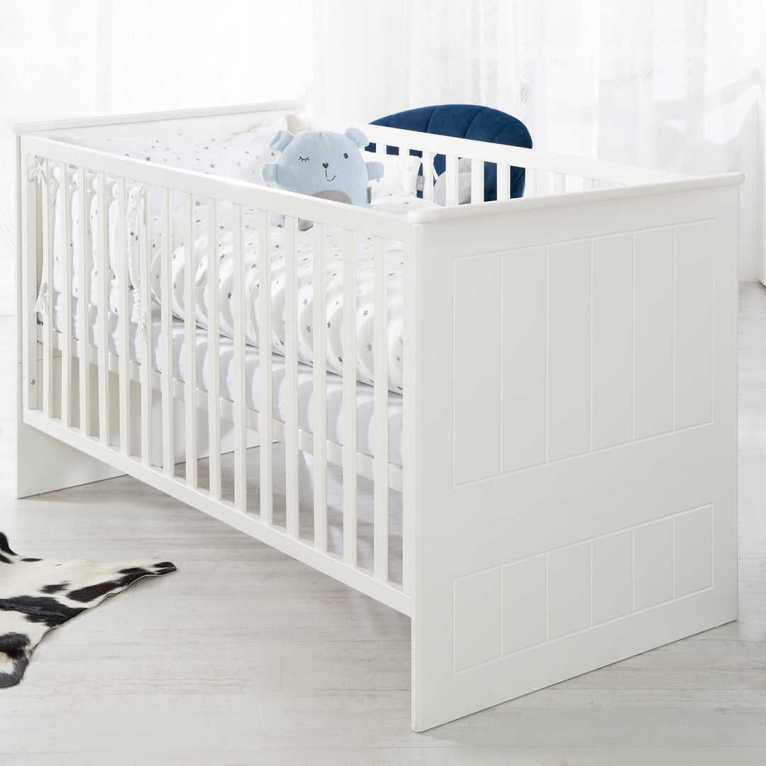 Cuna convertible 'Sylt', 70 x 140 cm, blanca, ajustable en altura, con 3 barrotes extraíbles, convertible