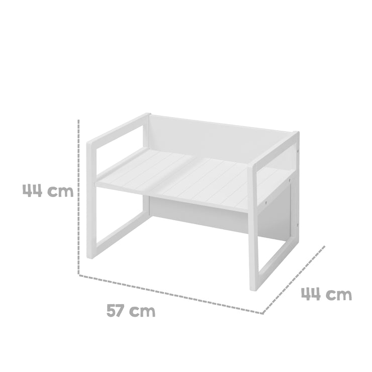 La panca rustica, bianca, può essere trasformata in 2 altezze di seduta o utilizzata come tavolino per bambini