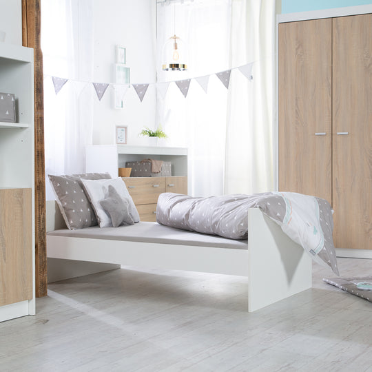 Cama infantil combinada 'Gabriella', 70 x 140 cm, blanca/natural, ajustable en altura, 3 barrotes extraíbles, convertible