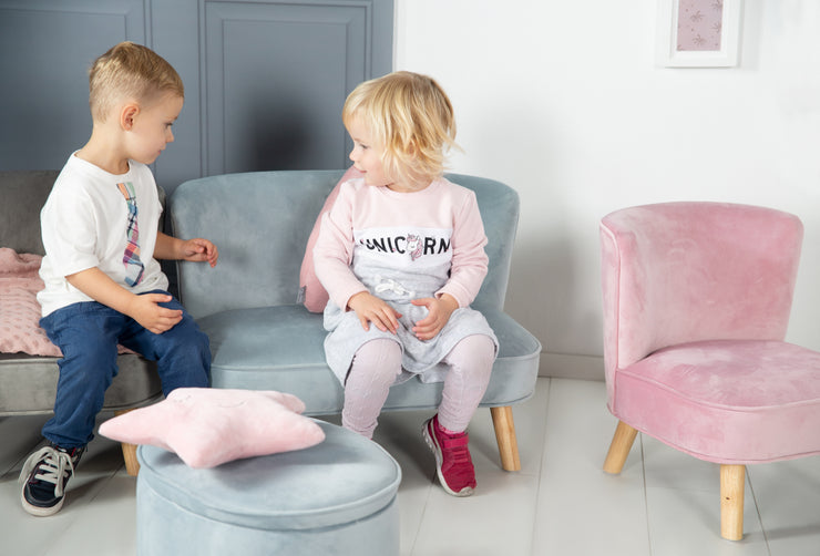 Children's couch made of light blue on wooden feet