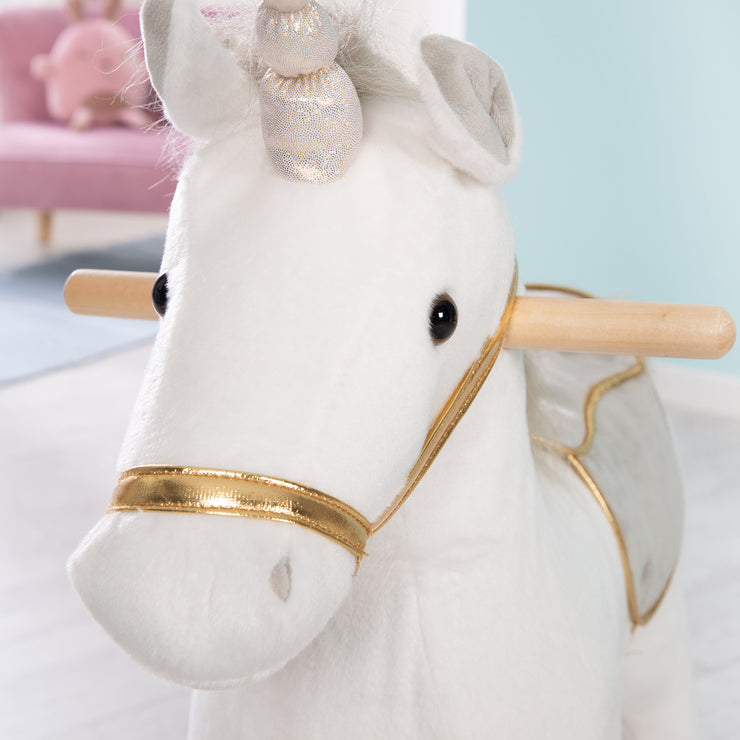 Unicorno a dondolo, imbottito, sella e briglia in grigio/oro, 63x31x73cm, da 24 mesi