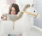 Unicornio mecedor, tapizado, sillín y brida en gris/oro, 63 x 31 x 73 cm, sonido, a partir de 24 meses