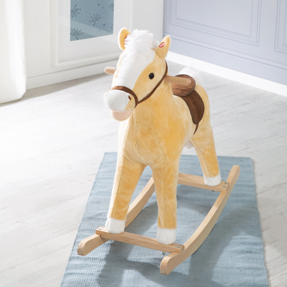 Caballo balancín, con gorro y bufanda navideños, acolchado, silla, sonido, 63 x 31 x 73 cm, a partir de 24 meses