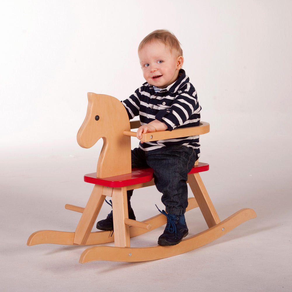 Caballo balancín de madera maciza, rojo natural, ajustable con anillo de protección desmontable