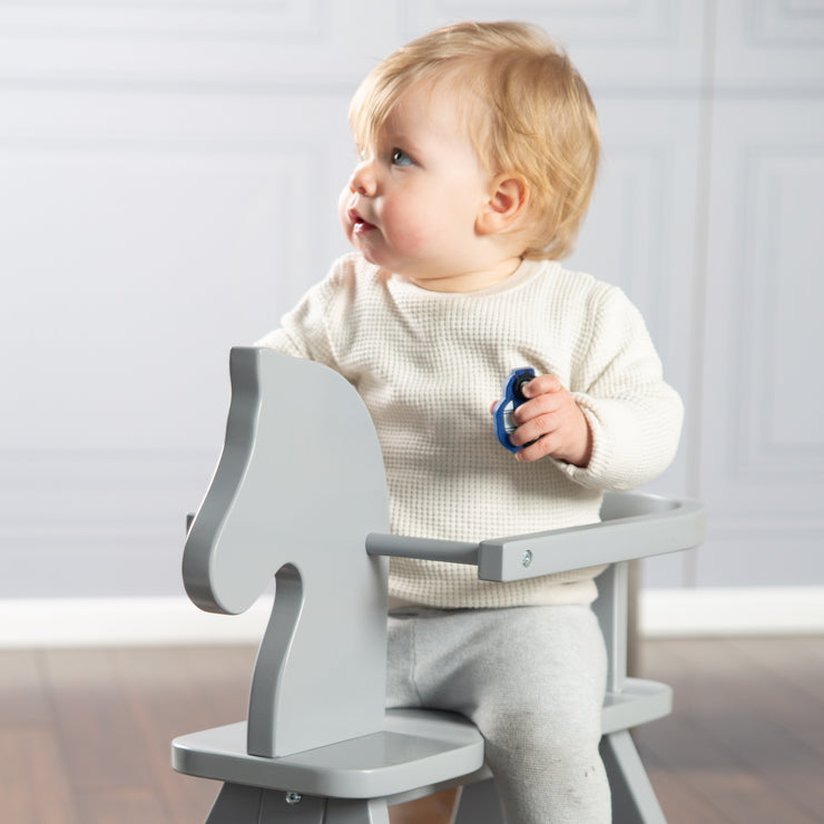 Rocking horse made of solid wood, grey lacquered, growing with removable protective ring