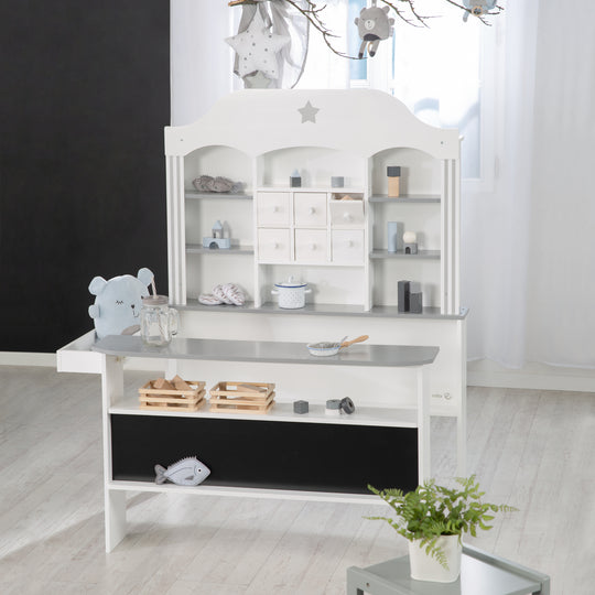 Candyshop blanc, avec accents gris, tiroirs, comptoir latéral et frontal
