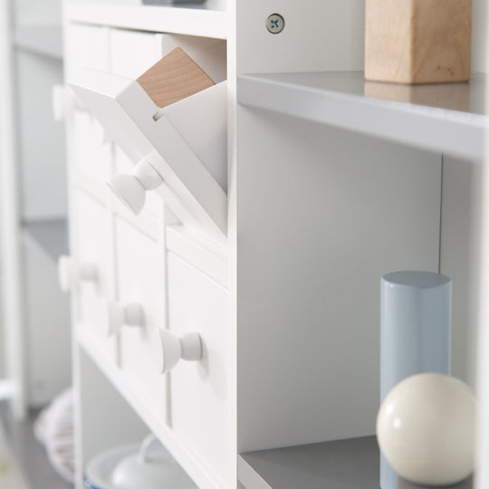 Candyshop blanc, avec accents gris, tiroirs, comptoir latéral et frontal
